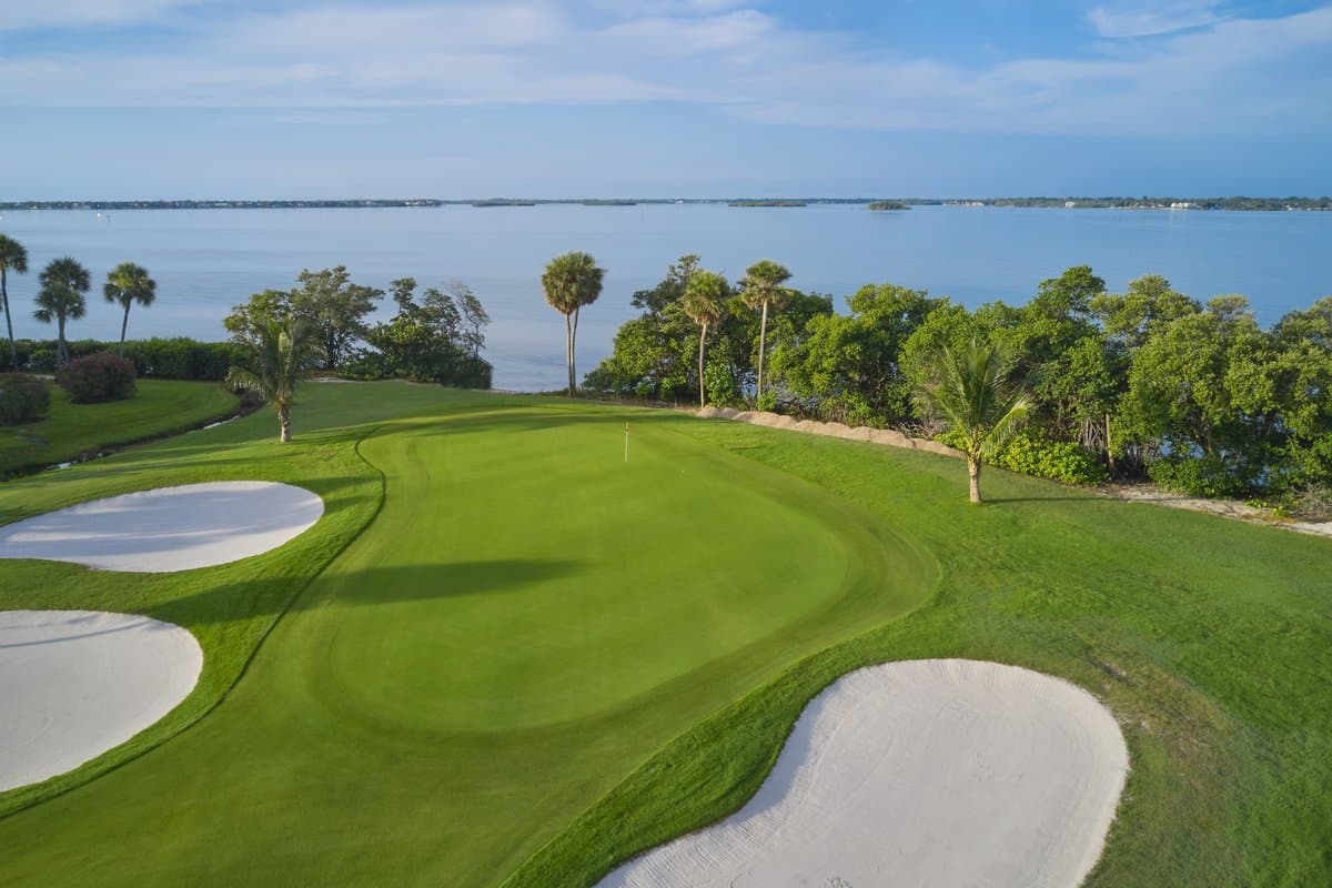 Ocean Club green and bunkers with the river beyond